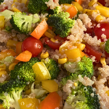 This Quinoa Vegetable Summer Salad is loaded with tons of fresh colorful veggies, crunchy quinoa, and a light vinaigrette dressing