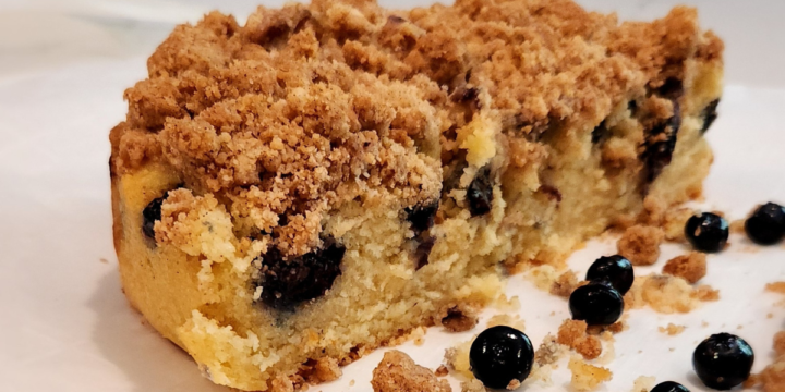 Crumbly Blueberry Breakfast Cake topped with a layer of thick crumble
