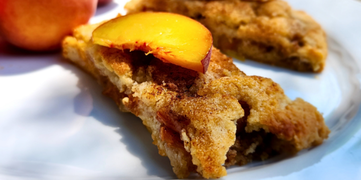 Easy Crostata with fresh peaches is made with a crumbly, buttery dough, and filled with ripe juicy peaches that are baked with brown sugar and cinnamon.
