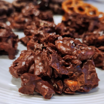 Loaded with Fritos, potato chips, and pretzels and dipped in sweet dark chocolate, The Best Salty Snacks Chocolate Clusters, are the ultimate treat to satisfy both your sweet and salty cravings!