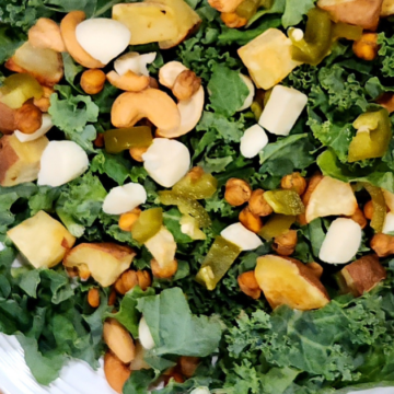 This Summer Fruit Spinach Couscous Salad is loaded with bright colorful peaches, cantaloupe, tomatoes, spinach, veggies, and crunchy couscous topped with slivered almonds, fresh mint, and a sweet honey vinaigrette.