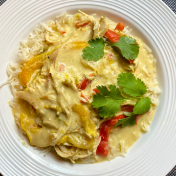 Shredded chicken is cooked in a delicious, creamy sauce made from cream cheese, salsa verde, and spices, with an extra kick from the pickled jalapenos.