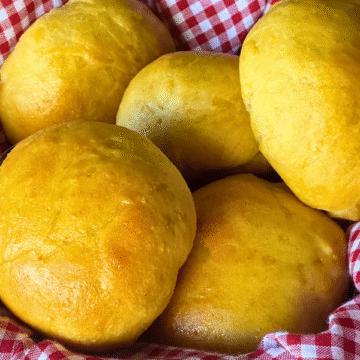 These sweet potato rolls are soft, tender, and lightly sweet topped with a delicate maple glaze that adds just the right touch of flavor. There's nothing better than homemade bread for a Thanksgiving, or holiday meal!
