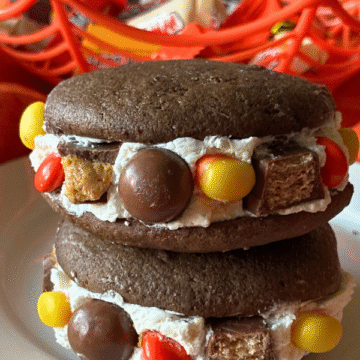 Whipped vanilla filling loaded with chunks of your favorite chocolate bars and sandwiched between two fluffy chocolatey cakes