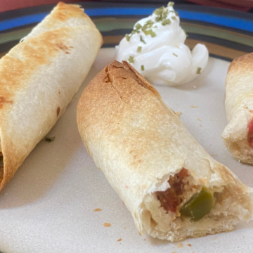 The flavor-packed creamy filling in 30 Minute Creamy Chicken Taquitos, is wrapped in a corn tortilla and baked until perfectly crisp.