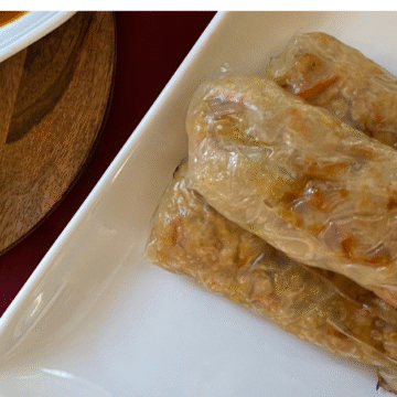These gluten free egg rolls transform the soft texture of rice paper into crispy perfection once they're baked.