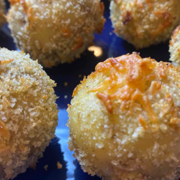 Crunchy seasoned breaded potatoes with cheese