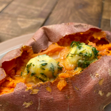 Place one tablespoon of butter into baked sweet potato and season with salt to taste.