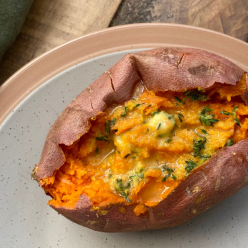 Place one tablespoon of butter into baked sweet potato and season with salt to taste.