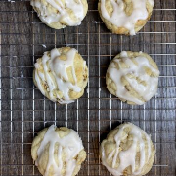 Buttery, thick, and soft, Candied Walnut Sugar Cookies are chock full of carmelized walnuts and topped with a light maple glaze