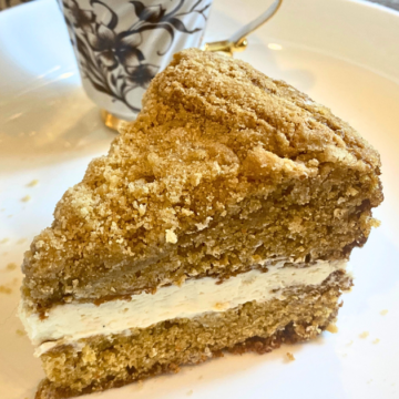 Cream Filled Crumble Coffee Cake has a Fluffy spiced cake with thick crumble streusel and light fluffy vanilla cream