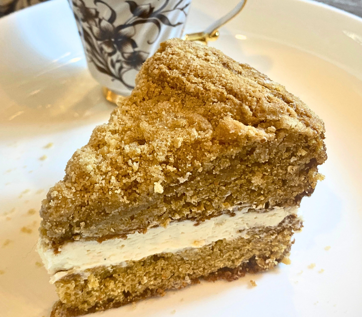 Cream Filled Crumble Coffee Cake has a Fluffy spiced cake with thick crumble streusel and light fluffy vanilla cream