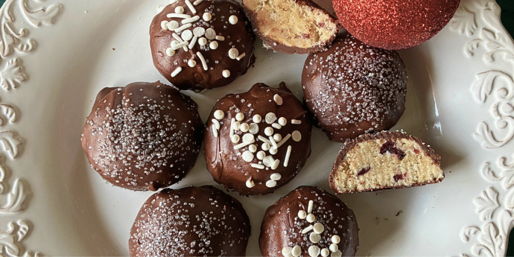 Chocolate Covered Cranberry Snowball Cookies