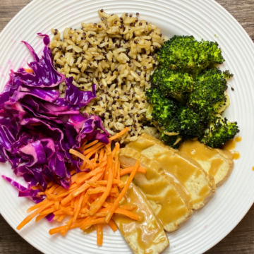 Loaded with crunchy quinoa, wild rice, colorful veggies, baked tofu, and tossed in a light peanut dressing.