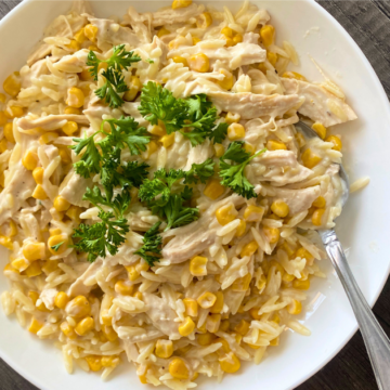 30-minute creamy corn & chicken orzo has tender orzo is tossed in a creamy cheese sauce with sweet corn kernels, Italian seasonings, and shredded chicken for a warm, delicious satisfying meal