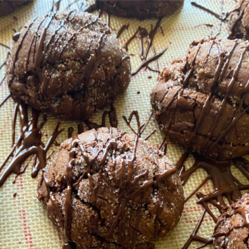 Thick and chewy, with a rich chocolate peanut butter flavor, rolled in cinnamon and sugar, then drizzled with more chocolate.