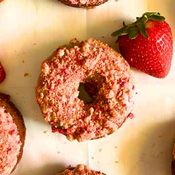 All the flavors and texture of an old-fashioned cake donut loaded with chocolate flavor, dipped in a vanilla glaze, and topped with the most delicious strawberry crunch!