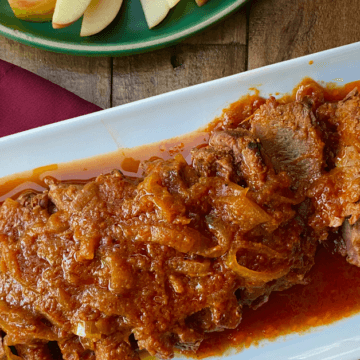 Bubbe's Holiday Brisket is smothered in sauce made from sautéed onions, spices, ketchup and horseradish and slow cooked until it's perfectly tender.