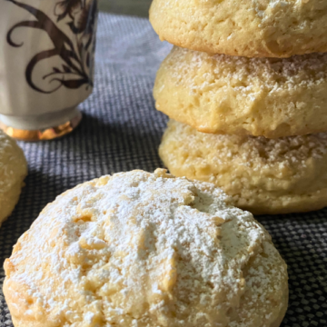 Light, fluffy, and soft with a touch of almond and powdered sugar