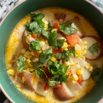 Summer Corn and Basil Chowder uses corn on the cob and fresh basil to capture the essence of Summer.