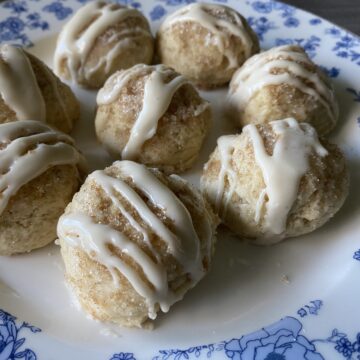 Light and fluffy, with a cinnamon sugar topping and drizzled in a light maple glaze.