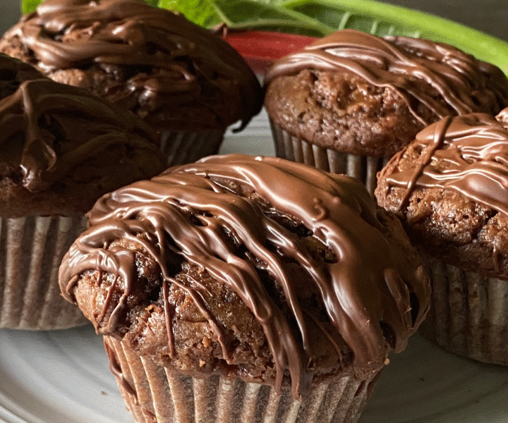 Rich, moist, and packed with chocolate flavor, these Double Chocolate Rhubarb Muffins are the perfect way to use fresh rhubarb. Tart rhubarb balances the sweetness of the chocolate, creating bakery-style muffins with a soft, tender crumb and plenty of chocolate chips in every bite.