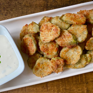 Super simple oven-baked pickles are an easy and tasty Summer appetizer.