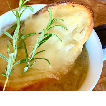 Seasonal ingredients make this rosemary brie french onion soup a perfect holiday twist on traditional French onion soup.