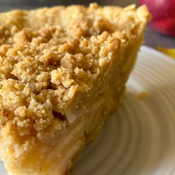 Two layers of flaky crust, bursting with tender cinnamon and caramel apples, with with a thick buttery crumb topping and baked until golden brown.