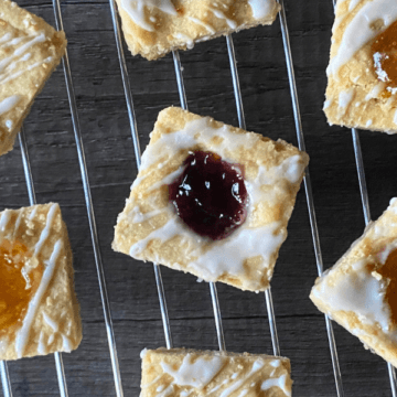 These bars transform the classic treat's buttery, melt-in-your-mouth texture, and delicate sweetness into an easy-to-make dessert bar, complete with the perfect amount of fruity jam in every bite!