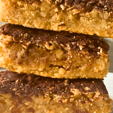 With just an almond cookie base and layers of walnuts, toasted coconut, and chocolate, they feel like an indulgent dessert that's also full of wholesome ingredients.
