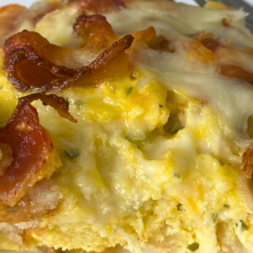 With creamy cheese, crispy bacon, savory herbs, fluffy eggs and a thick bread base that gives it a quiche-like texture, it's a hearty satisfying breakfast.