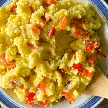 Roasted Red Pepper & Mozzarella Mashed Potatoes are creamy and buttery with smoky, sweet, roasted red peppers and gooey pockets of melted mozzarella