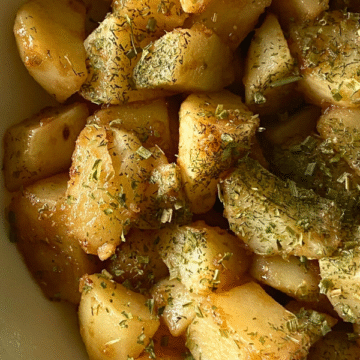 Light and Easy Herbed Potato Salad is tossed in a simple, flavorful dressing made with balsamic vinegar, olive oil, honey