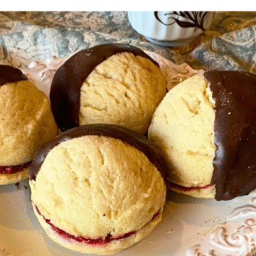 Melt in your mouth and buttery, filled with homemade raspberry jam and dipped in smooth, velvety chocolate.