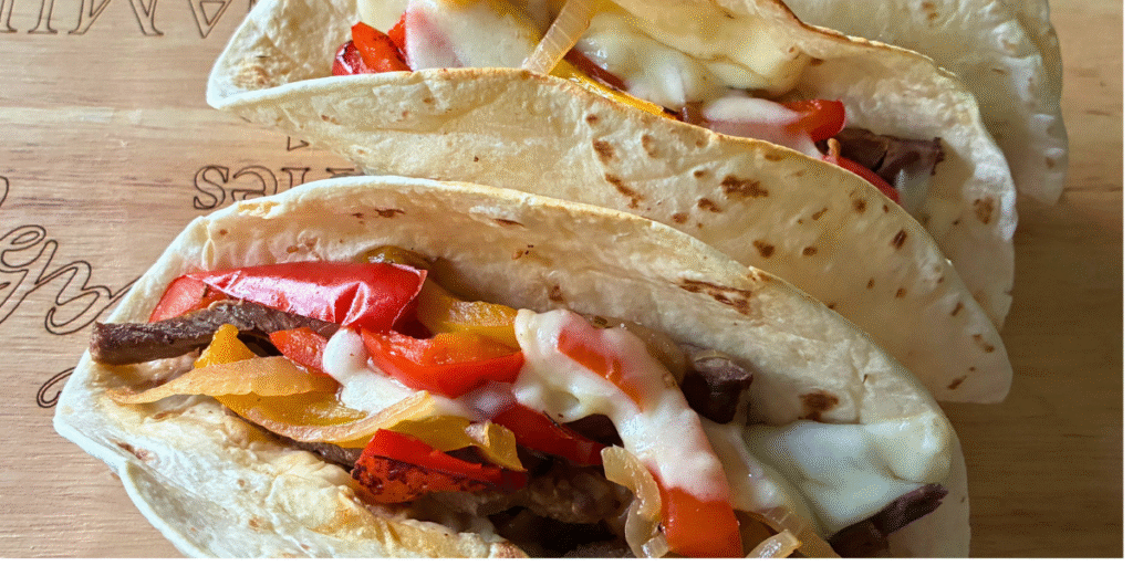 Crockpot Philly Cheesesteak Tacos (Easy Slow Cooker Dinner)