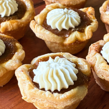 Buttery crust, silky pumpkin filling, warm spices and a whipped cream topping