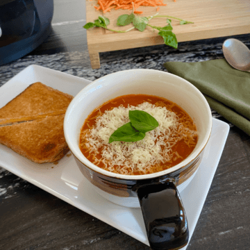 This cheesy instant pot tomato soup is ready in under 30 minutes.