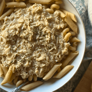 This Slow Cooker Parmesan Butter Chicken cooks low and slow in savory broth and butter, then finishes with a light but generous Parmesan sauce that’s perfect for spooning over pasta. It's the perfect family friendly slow cooker chicken dinner