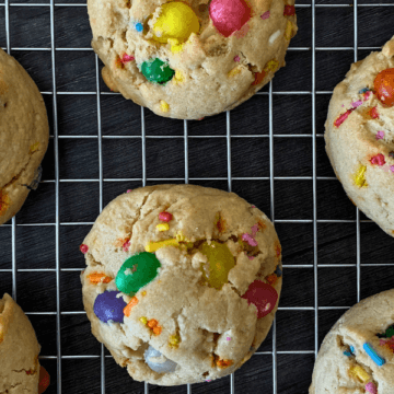 These soft and chewy jelly bean sugar cookies are everything you want in a bakery-style cookie—thick, tender, and packed with pastel sprinkles and sweet candy centers.