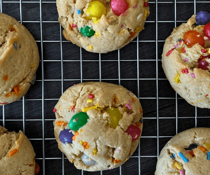 These soft and chewy jelly bean sugar cookies are everything you want in a bakery-style cookie—thick, tender, and packed with pastel sprinkles and sweet candy centers.