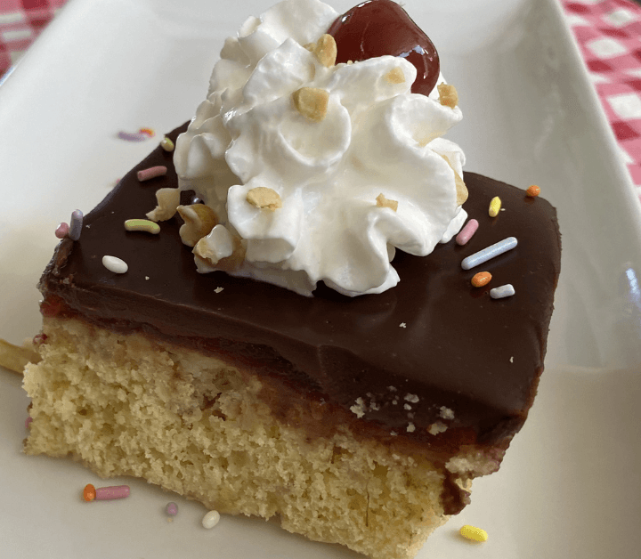 This easy banana split cake starts with a cake mix to create a simple, fun and super tasty dessert.