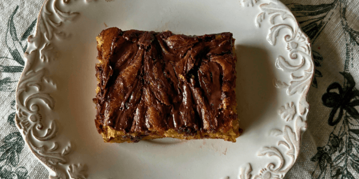 Gluten Free Banana Chocolate Ripple Cake (Easy, Moist Snack Cake) is soft, moist, and swirled with melted chocolate for rich, gooey bites in every slice.