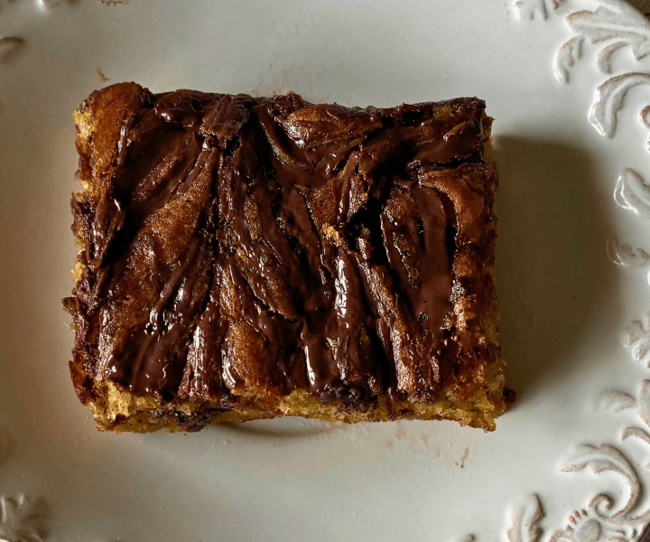 Gluten Free Banana Chocolate Ripple Cake (Easy, Moist Snack Cake) is soft, moist, and swirled with melted chocolate for rich, gooey bites in every slice.