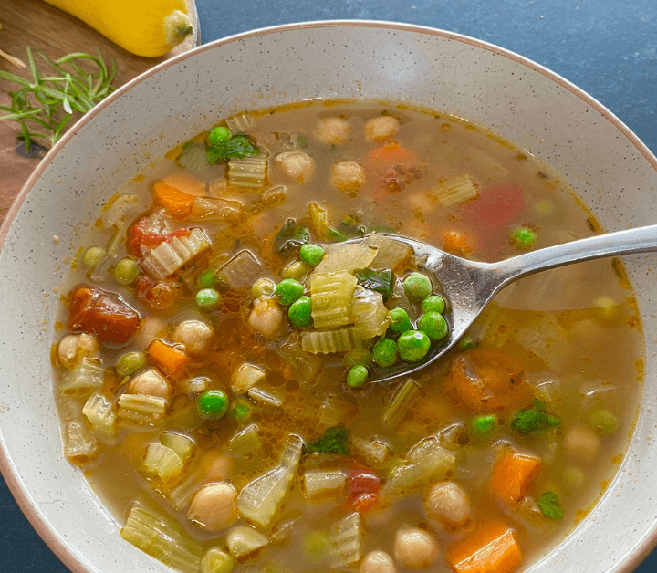This warm and cozy cheesy Parmesan Vegetable soup is packed with nutritious veggies and beans for added fiber and protein.