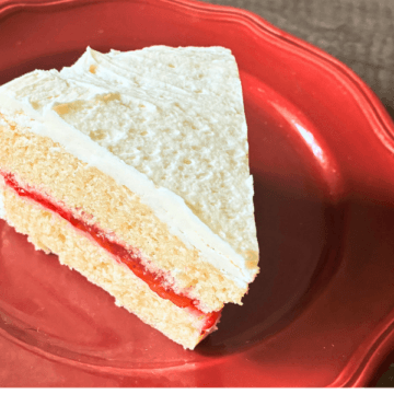Fresh Strawberry Vanilla Layer Cake is a soft, buttery vanilla cake layered with a sweet homemade strawberry filling and finished with rich vanilla buttercream.