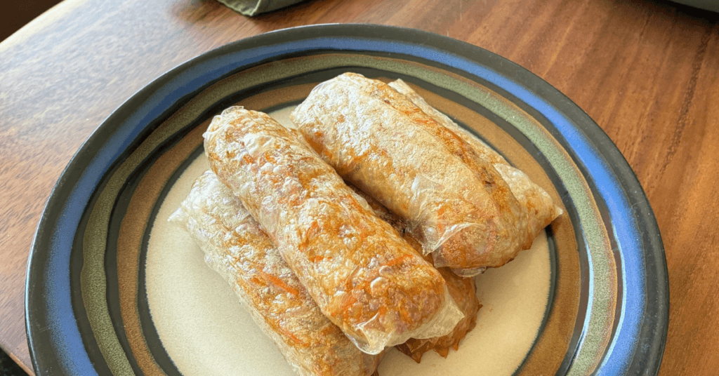 These gluten free egg rolls transform the soft texture of rice paper into crispy perfection once they're baked.