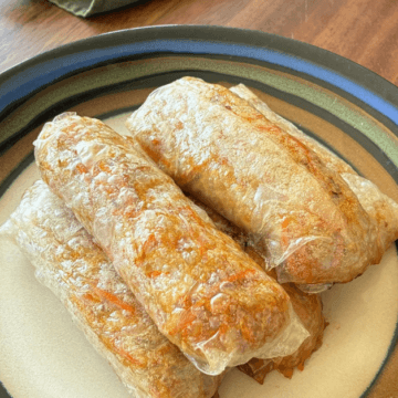 These gluten free egg rolls transform the soft texture of rice paper into crispy perfection once they're baked.