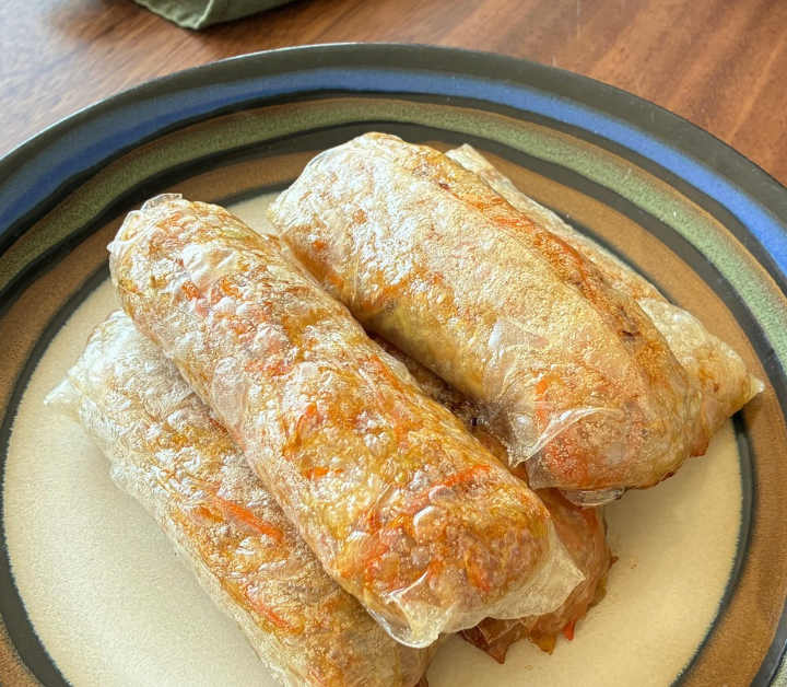 These gluten free egg rolls transform the soft texture of rice paper into crispy perfection once they're baked.