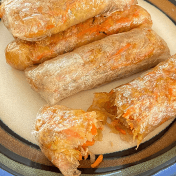 These gluten free egg rolls transform the soft texture of rice paper into crispy perfection once they're baked.